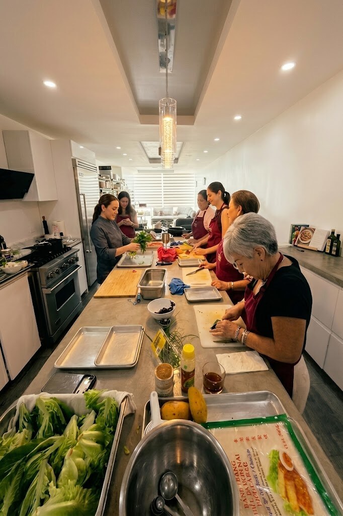 Guests prepping dishes during the cooking workshop